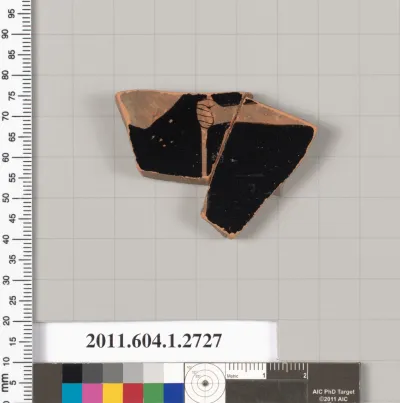 Terracotta fragment of a kylix (drinking cup)