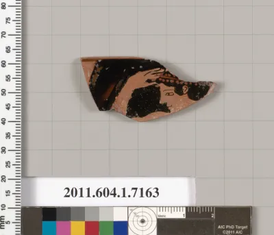 Terracotta rim fragment of a kylix (drinking cup)