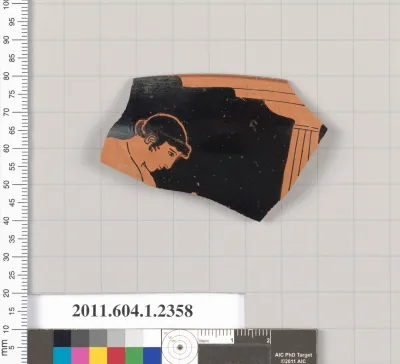 Terracotta rim fragment of a kylix (drinking cup)