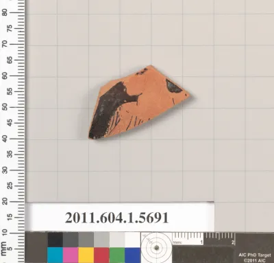 Terracotta fragment of a kylix (drinking cup)