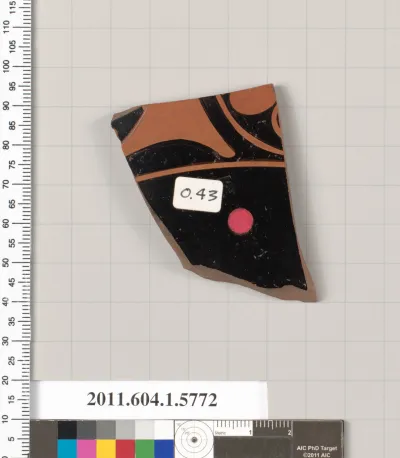 Terracotta fragment of a kylix: eye-cup  (drinking cup)