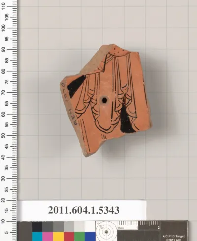 Terracotta fragment of a kylix (drinking cup)