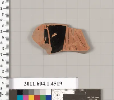 Terracotta fragment of a kylix (drinking cup)