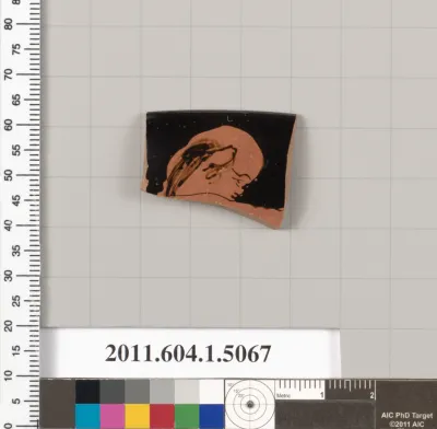 Terracotta rim fragment of a kylix (drinking cup)