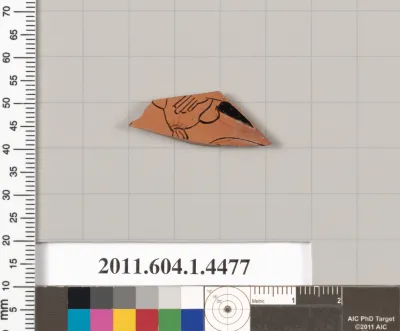 Terracotta fragment of a kylix (drinking cup)