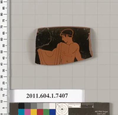 Terracotta rim fragment of a kylix (drinking cup)