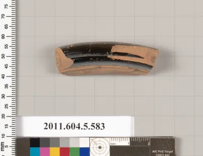 Terracotta fragment of a stemless kylix (drinking cup)?