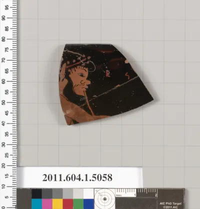 Terracotta fragment of a kylix (drinking cup)