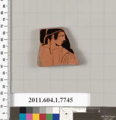 Terracotta fragment of a kylix (drinking cup)