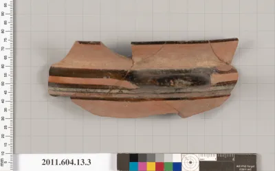 Terracotta fragment of a kylix (drinking cup)