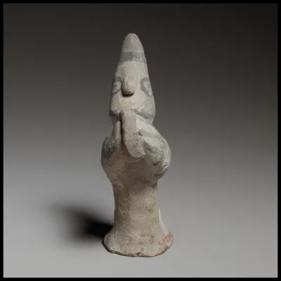 Standing male tambourine player