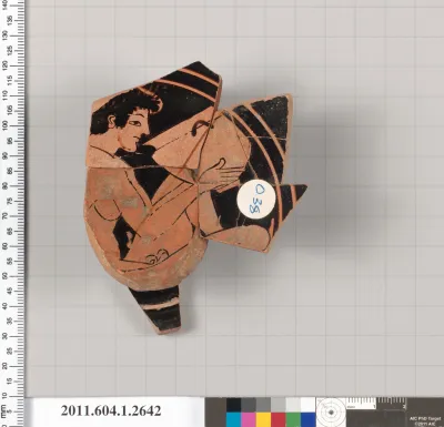 Terracotta fragment of a kylix (drinking cup)