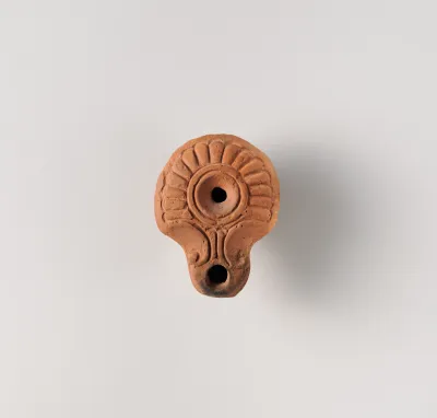 Terracotta oil lamp