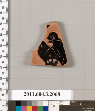 Terracotta fragment of a kylix (drinking cup)