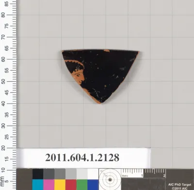 Terracotta rim fragment of a kylix (drinking cup)