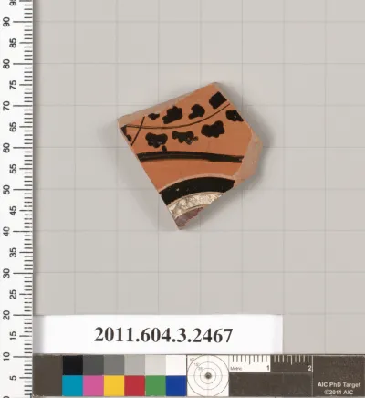 Terracotta fragment of a kylix: eye-cup (drinking cup)