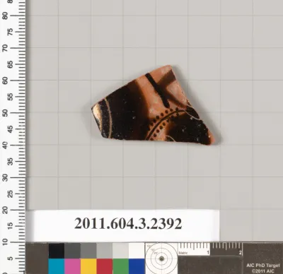 Terracotta fragment of a kylix: eye-cup (drinking cup)