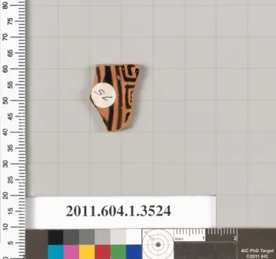 Terracotta fragment of a kylix (drinking cup)