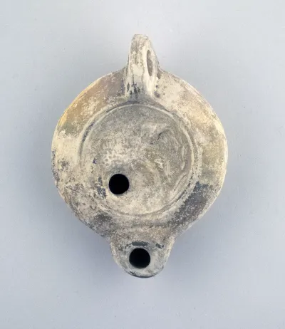 Terracotta oil lamp