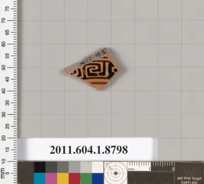 Terracotta fragment of a kylix (drinking cup)