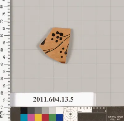 Terracotta fragment rim of a kylix (drinking cup)