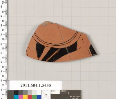 Terracotta fragment of a kylix (drinking cup)