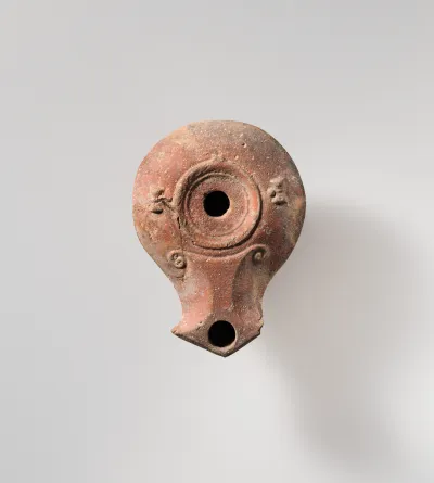 Terracotta oil lamp