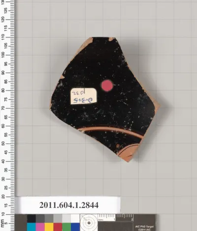 Terracotta fragment of a kylix (drinking cup)