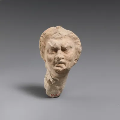 Terracotta head of an old woman
