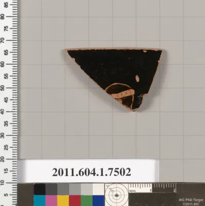 Terracotta rim fragment of a kylix (drinking cup)