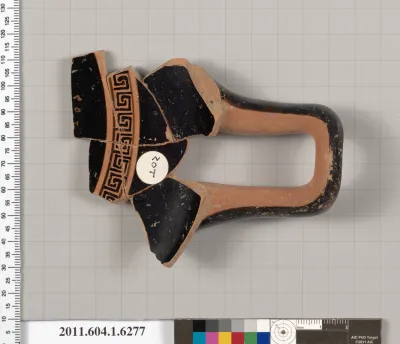 Terracotta fragment of a kylix (drinking cup)