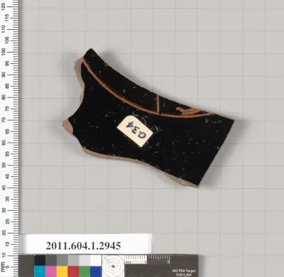 Terracotta fragment of a kylix (drinking cup)