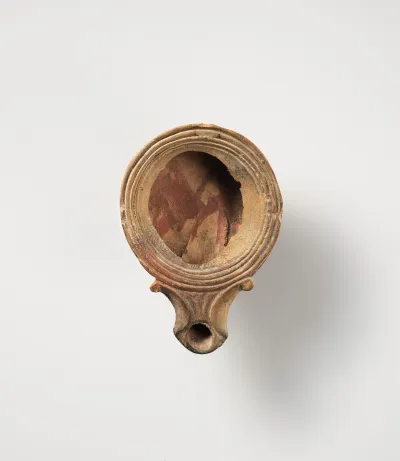 Terracotta oil lamp
