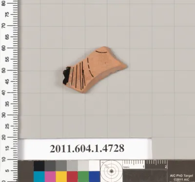 Terracotta fragment of a kylix (drinking cup)