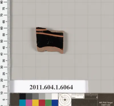 Terracotta fragment of a kylix (drinking cup)