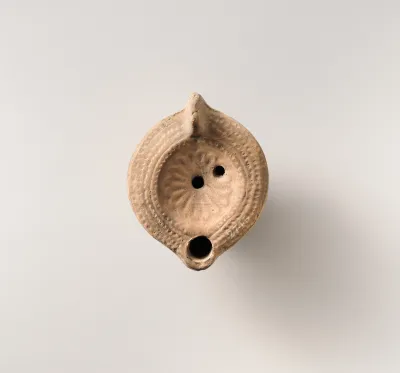 Terracotta oil lamp