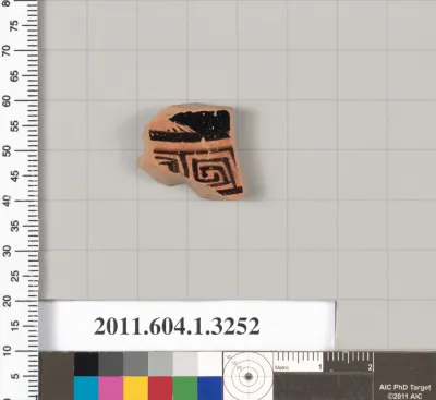 Terracotta fragment of a kylix (drinking cup)