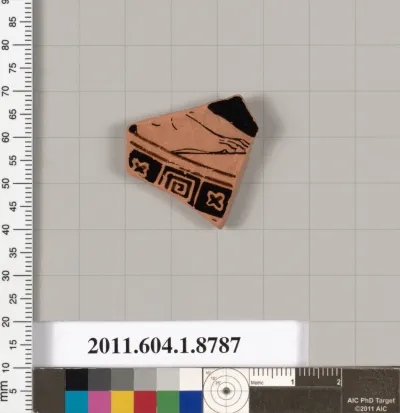 Terracotta fragment of a kylix (drinking cup)