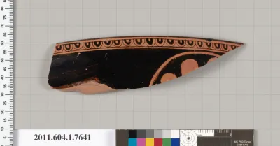 Terracotta fragment of a kylix (drinking cup)