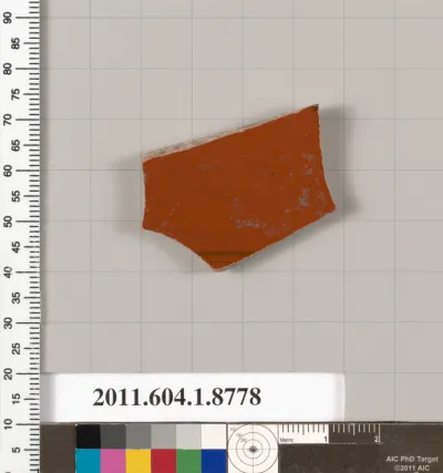 Terracotta fragment of a stemless kylix (drinking cup)?