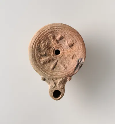 Terracotta oil lamp
