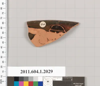 Terracotta rim fragment of a kylix (drinking cup)