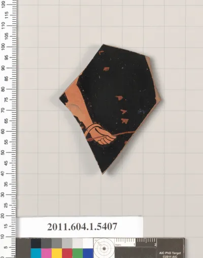 Terracotta fragment of a kylix (drinking cup)