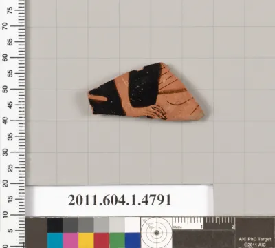 Terracotta fragment of a kylix (drinking cup)