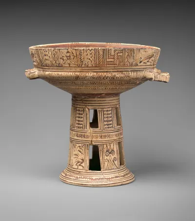 Terracotta bowl on a high stand
