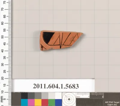 Terracotta fragment of a kylix (drinking cup)