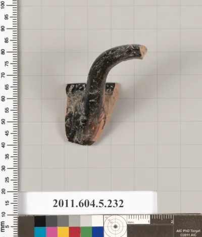 Terracotta rim fragment of a kylix (drinking cup)