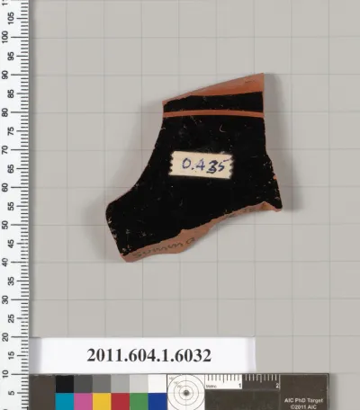 Terracotta fragment of a kylix (drinking cup)