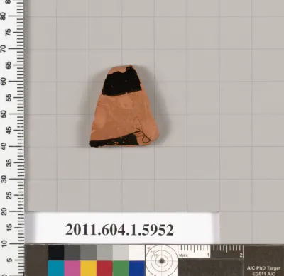 Terracotta fragment of a kylix (drinking cup)