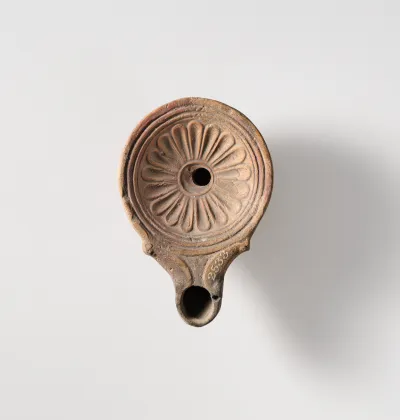 Terracotta oil lamp